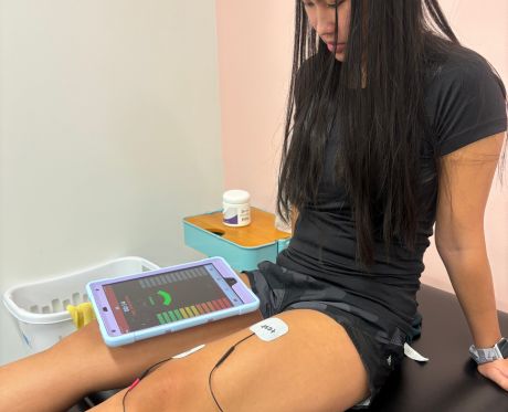Patient utilizing MTrigger biofeedback for quad activation. Regaining proper quad activation is an important part of rehab following MPFL reconstruction.
